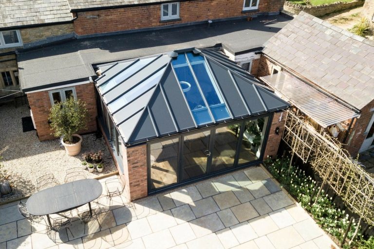 Livinroof solid conservatory roof with dark grey panels