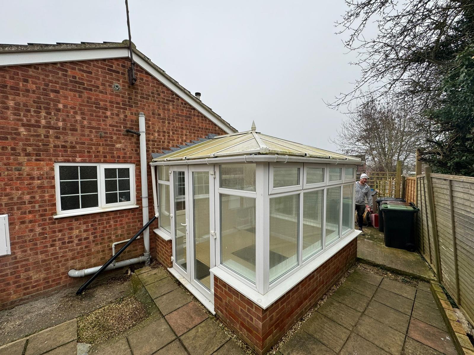 before - old polycarbonate conservatory roof