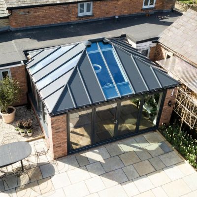 Livinroof solid conservatory roof with dark grey panels